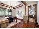 Open dining room with access to adjacent room at 22759 Mountain Spirit Way, Indian Hills, CO 80454