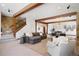 Finished basement with comfortable seating area and fireplace at 22759 Mountain Spirit Way, Indian Hills, CO 80454