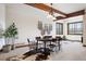Basement game/yoga room with a rustic table and mountain views at 22759 Mountain Spirit Way, Indian Hills, CO 80454