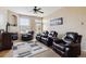 Spacious living room with fireplace, large windows and comfortable seating at 5703 N Gibralter Way # 204, Aurora, CO 80019