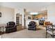 Open concept kitchen with island and stainless steel appliances at 5703 N Gibralter Way # 204, Aurora, CO 80019