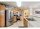Bright kitchen with stainless steel appliances and ample cabinetry at 5703 N Gibralter Way # 204, Aurora, CO 80019