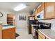 Clean and functional kitchen, offering stainless steel appliances at 5703 N Gibralter Way # 204, Aurora, CO 80019