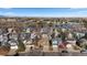 Aerial view of house and neighborhood near lake at 9909 W 99Th Ave, Broomfield, CO 80021