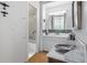Bright bathroom with a vanity, shower/tub combo and linen closet at 3100 E Cherry Creek South Dr # 303, Denver, CO 80209