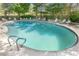 Inviting community pool with plenty of lounge chairs at 3100 E Cherry Creek South Dr # 303, Denver, CO 80209