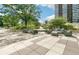 Relaxing community patio with seating and fountain at 3100 E Cherry Creek South Dr # 303, Denver, CO 80209