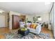 Open concept living and dining area with hardwood floors at 3100 E Cherry Creek South Dr # 303, Denver, CO 80209