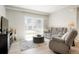 Spacious living room with sliding door to patio at 15700 E Jamison Dr # 8-103, Englewood, CO 80112