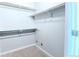 Large walk-in closet with double hanging rods and shelves at 15700 E Jamison Dr # 8-103, Englewood, CO 80112
