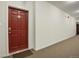 Apartment building hallway with carpet and doors at 15700 E Jamison Dr # 8-103, Englewood, CO 80112