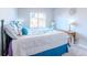 Bedroom with a queen-size bed, and a side table at 15700 E Jamison Dr # 8-103, Englewood, CO 80112