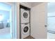 Stackable washer and dryer in convenient laundry closet at 15700 E Jamison Dr # 8-103, Englewood, CO 80112