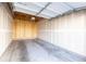 Unfinished one-car garage with overhead door at 15700 E Jamison Dr # 8-103, Englewood, CO 80112