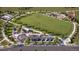 Community park with playground, open green space, and parking at 6736 E 149Th Dr, Thornton, CO 80602