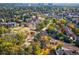 Aerial shot showcasing community and surrounding autumn foliage at 1355 S Ulster St, Denver, CO 80231