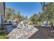 Charming flagstone patio with seating and a swing at 7761 W Ottawa Pl, Littleton, CO 80128