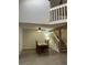 Dining area with a wood table and high ceilings at 9934 Grove St # C, Westminster, CO 80031