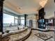 Luxurious Primary bathroom with a large soaking tub and fireplace at 24503 Chris Dr, Evergreen, CO 80439