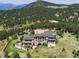 Luxury home with mountain views and expansive grounds at 24503 Chris Dr, Evergreen, CO 80439