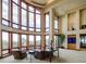 Spacious living area with floor-to-ceiling windows and mountain views at 24503 Chris Dr, Evergreen, CO 80439