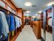Large walk-in closet with ample shelving and hanging space at 24503 Chris Dr, Evergreen, CO 80439