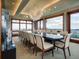 Elegant dining room with a large table and stunning mountain views at 24503 Chris Dr, Evergreen, CO 80439