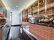 Modern kitchen with granite countertops and stainless steel appliances at 24503 Chris Dr, Evergreen, CO 80439