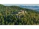 Mountaintop estate offering stunning views and private setting at 24503 Chris Dr, Evergreen, CO 80439