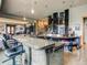 Basement bar with granite countertop and seating for entertaining at 24503 Chris Dr, Evergreen, CO 80439