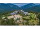 Luxury home with mountain views, expansive grounds, and a large motor court at 24503 Chris Dr, Evergreen, CO 80439