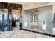 Primary bathroom with marble flooring and a large walk-in shower at 24503 Chris Dr, Evergreen, CO 80439