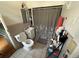 Clean bathroom with shower/tub combo, toilet and vanity at 2560 S Broadway, Denver, CO 80210