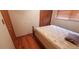 Simple bedroom with wood floors and a double bed at 8120 S Jay Dr, Littleton, CO 80128