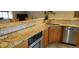 Modern kitchen with granite countertops and stainless steel appliances at 8120 S Jay Dr, Littleton, CO 80128