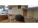 Small deck with gas grill and storage at 8120 S Jay Dr, Littleton, CO 80128
