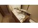 Bathroom with double vanity and granite countertops at 8120 S Jay Dr, Littleton, CO 80128