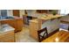 Large kitchen with island and breakfast bar at 8120 S Jay Dr, Littleton, CO 80128