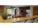 Spacious kitchen with island and granite countertops at 8120 S Jay Dr, Littleton, CO 80128