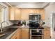 Kitchen features stainless steel appliances and light wood cabinets at 3361 W 134Th Ave, Broomfield, CO 80020