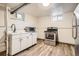 Small, galley-style basement kitchen with stainless steel appliances at 1460 Tennyson St, Denver, CO 80204