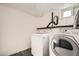 Basement laundry room with washer and dryer hookups at 1460 Tennyson St, Denver, CO 80204