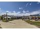 Mixed-use development with a large open space and play area at 24786 E Evans Dr, Aurora, CO 80018