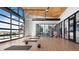 Bright yoga studio with hardwood floors and large windows at 4769 Weitbrec Ln, Castle Rock, CO 80104