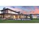 Luxury community clubhouse with large patio and outdoor seating area at 4769 Weitbrec Ln, Castle Rock, CO 80104