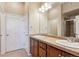 Double vanity bathroom with a shower and tile flooring at 7865 Vallagio Ln # 207, Englewood, CO 80112