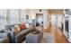 Living room with hardwood floors and views to bedroom at 7865 Vallagio Ln # 207, Englewood, CO 80112