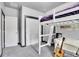 Cozy bedroom with a loft bed, guitar, and small couch at 7881 St Vrain Dr, Frederick, CO 80530