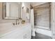Bathroom with a bathtub and single vanity at 3354 W 18Th Ave, Denver, CO 80204