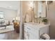 Modern bathroom with white vanity, quartz countertop and a large mirror at 3354 W 18Th Ave, Denver, CO 80204